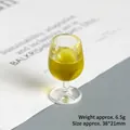 Macro detail of miniature wine glass charm showing dimensions 38x21mm and 6.5g weight - Ginger Yellow