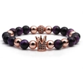 Detailed shot of purple tiger eye stone beads and rose gold crown charm on elastic bracelet - Purple Tiger Eye Rose Gold