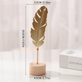 Golden iron feather sculpture with wooden base for elegant home and desk decoration - Feather-Gold