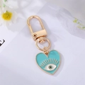 Golden heart keychain with light blue enamel finish and evil eye pattern charm - Lake Blue Heart Eyelash Eye