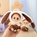 Labubu doll accessory featuring a cute brown and white rabbit outfit plush costume - Brown-eared Bunny Set / First And Second Generation Keychains Are Compatible With La Cloth Dolls. Dolls Not Included.