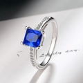 Macro shot of S925 silver ring featuring square blue zircon and detailed side stones - Royal Blue Zirconia