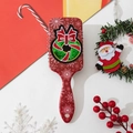 Detail of red Christmas air cushion hairbrush with snowflake pattern and sequin wreath - Standard Spec / Red Snowflake Christmas