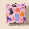 Detail of pink flannel Halloween blanket featuring black cats, pumpkins, and spooky patterns - Style 62 (Halloween Pink Cartoon)