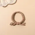 Detail of khaki braided hair tie with a bow knot and elegant gold metal end caps - Braided Style / Milk Coffee