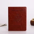 Brown leather passport holder with embossed United States coat of arms and logo - Brown