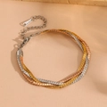 Close-up of tricolor woven snake chains with lobster clasp and adjustable link - Tri-color Bracelet