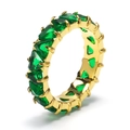 Macro view showing triangular green zircon stones set in a gold-plated titanium steel ring - US 6 / Gold Green Zirconia