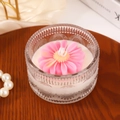 Pink flower scented candle in relief glass jar on warm wooden tray decor - Pink Gerbera Shape