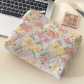 Close-up of quilted floral cosmetic bag showing soft cotton texture and embroidery label - Oil Painting Floral (Clutch Bag)