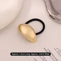 Minimalist golden metal hair tie with matte finish, elastic band, size 5.6cm x 2.8cm - Kc Golden Oval