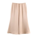 Detail of champagne satin fabric showing smooth texture and elastic waistband - XS / Apricot