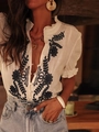 Women's V-neck white embroidered shirt with floral patterns and button-down front - L / White