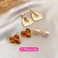 Close-up of a 3-pair vintage earring set with gold geometric, amber heart and beige studs - 17# Silver Needle - Gold/Brown (6-Piece Set)