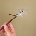 Handcrafted bamboo-shaped wooden hairpin with a pink-green glazed flower and pearl detail - Iridescent Pink Green (S391)