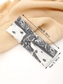 Detail showing the 21cm by 9cm dimensions of the paisley printed elastic headband - Black White Paisley