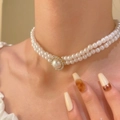 Double-layer white pearl necklace with large diamond-encrusted pendant worn by model - KC Gold (6274)