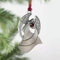 Silver metal angel ornament with red heart detail on green Christmas tree branch - Angel Antique Silver / Antique Silver