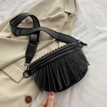 Black leather saddle bag featuring metal tassels and wide chevron shoulder strap - Black