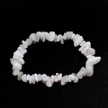 Macro detail of natural white irregular agate stone beads on elastic bracelet - White Moonstone