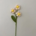 Handmade crochet puff flower in cream and yellow colors with green stem and leaves - Flesh Pink