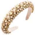 Close-up of baroque headband with pearls and champagne crystals on gold base - Brown