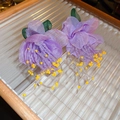 Close-up of purple fabric flower earrings with beaded tassels on a wooden tray - Purple Fabric Flower Tassels (42#)