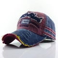 Detail of vintage washed baseball cap with Shark embroidery and distressed frayed edges - Red + Navy Blue