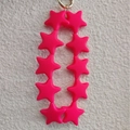 Cute pink silicone star keychain featuring twelve 3D stars with a golden metal ring - Pink (10 Stars)