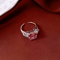 Detail of a square pink zircon ring on burgundy silk fabric with silver band - Adjustable Open / Silver Color Pink Stone