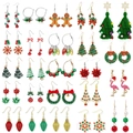 Set of festive Christmas earrings featuring colorful trees, bells, and snowflakes - 24 Pairs Set