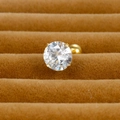 Close-up of a gold four-prong round zircon stud earring with a secure screw-back closure - 7mm / Gold