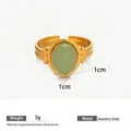 Gold plated stainless steel open ring featuring a polished oval green natural stone - Green Aventurine (Gold Plated) / Green Gold