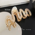 Elegant 10.5cm wavy gold metal hair claw clip with iridescent white resin finish - Beige