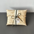 Macro view of handmade bamboo gift basket with green ribbon and pearl thank you tag - Flat Box Green Cord Style