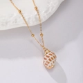 Gold plated bead chain necklace featuring a natural spotted seashell pendant in boho style - Gold Bead Chain-Brown Conch