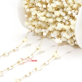 Golden stainless steel chain with 7mm white shell beads on a white plastic spool - Irregular Stone Style (F2335) / 7mm / Gold