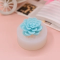 White silicone flower mold with blue rose candle on a decorative pink background - 3D Multi-layer Flower (2) / Style 2