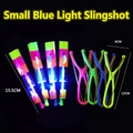 Close-up of LED glowing slingshot rocket toys with four colorful launchers and light-up heads - Slingshot Flying Arrow (Blue Light)