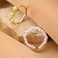 Minimalist gold bow ring with opal and pearl beaded band set on elegant fabric - Gemstone Pearl Ring Set (9621)