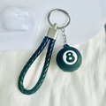 Miniature black number 8 pool ball keychain with woven leather strap on white fabric - No.8 (Black)