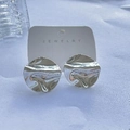 Irregular textured wavy round stud earrings in shiny silver finish on a display card - Wave Texture Disc / Steel
