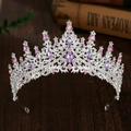 Detail of silver bridal crown with purple and pink crystals on dark wooden desk - Silver with Pink Purple