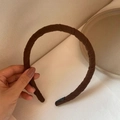 Minimalist mocha brown fabric wrapped headband with a spiral textured design for women - Coffee