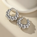 Polished silver chunky hoop earrings with textured croissant design and high-shine finish - Segmented Croissant Hoop / Silver