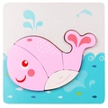 3D wooden puzzle for kids featuring a cute pink whale design on a blue ocean base board - Jm 3d - Whale