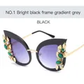Bright black cat eye sunglasses with rhinestone leaf accents and gradient purple lenses - Glossy Black/Grey Lens