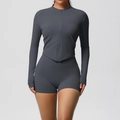 Close-up of deep grey yoga set with zip-up jacket and high-waist slimming shorts - Graphite Grey