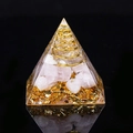 Orgone pyramid with pink crystal quartz, golden spiral, and gold foil on black background - Kunzite
