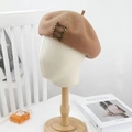 Camel wool beret hat with vintage metal buckle detail on a studio mannequin stand - M (56-58cm) / Gold Buckle - Khaki